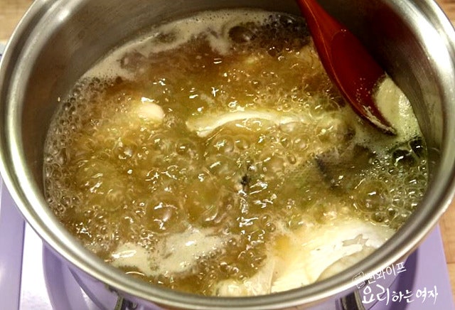 Simmer the doenjang soup — step photo 1