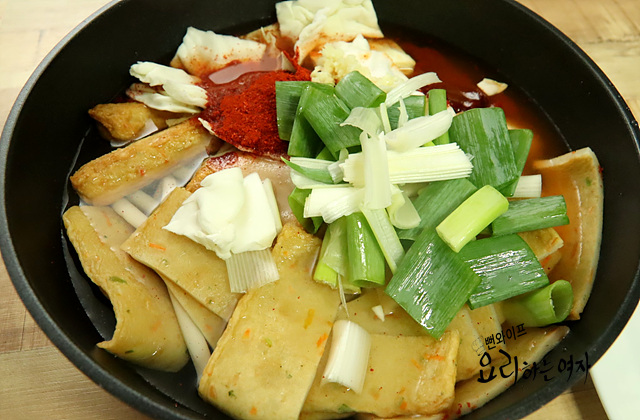 Add ingredients, seasonings, and simmer — step photo 1