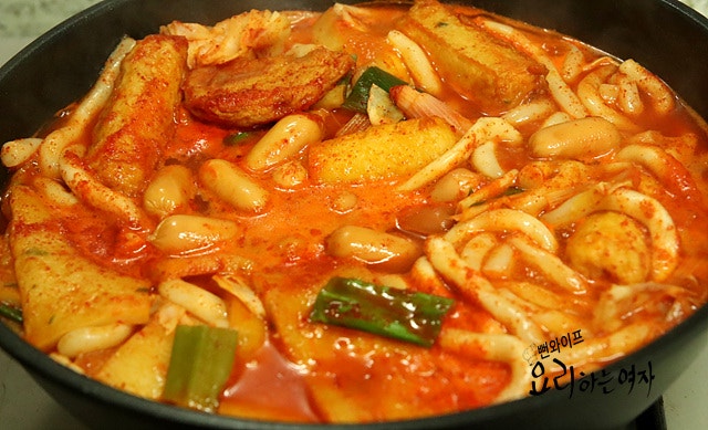Add ingredients, seasonings, and simmer — step photo 3
