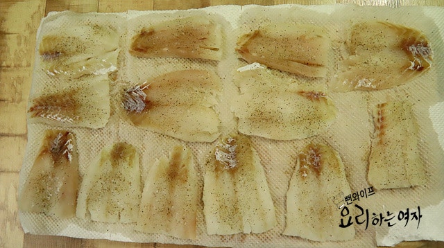 Season the pollock fillets — step photo 2