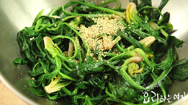 Season the spinach — step photo 2