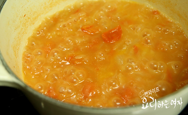 Add tomatoes and simmer — step photo 1