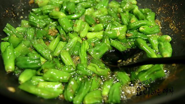 Simmer the shishito peppers — step photo