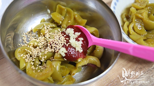 Season the pickled green plums — step photo 2