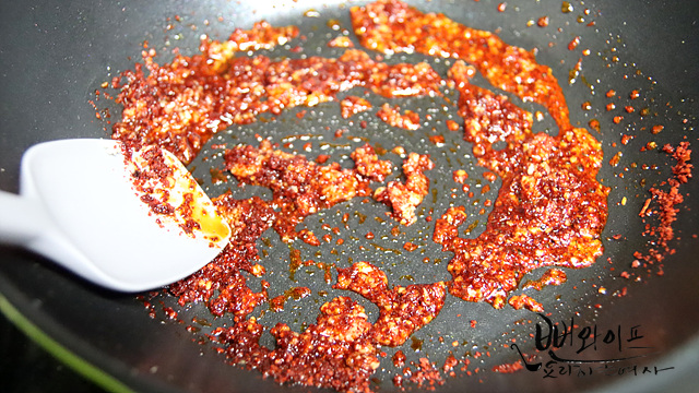 Stir-fry the shishito peppers — step photo 1
