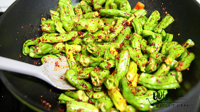 Stir-fry the shishito peppers — step photo 2