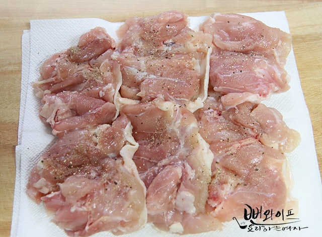 Season chicken and cut ingredients — step photo 1