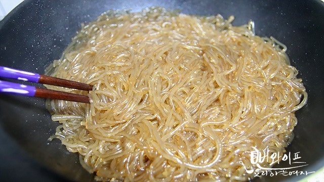 Stir-fry the noodles — step photo 2