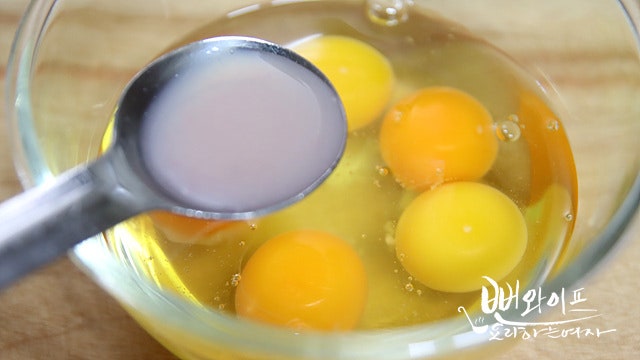Season the eggs — step photo 1