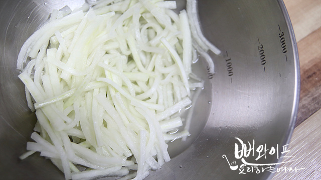 Salting the radish — step photo 2