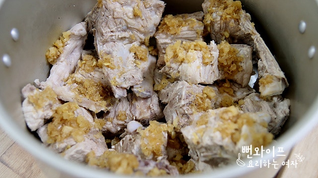Season the pork backbone — step photo 2