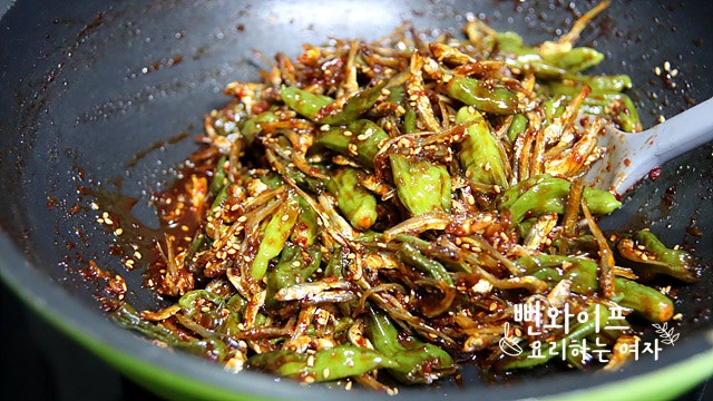 Add the anchovies and toss — step photo 2