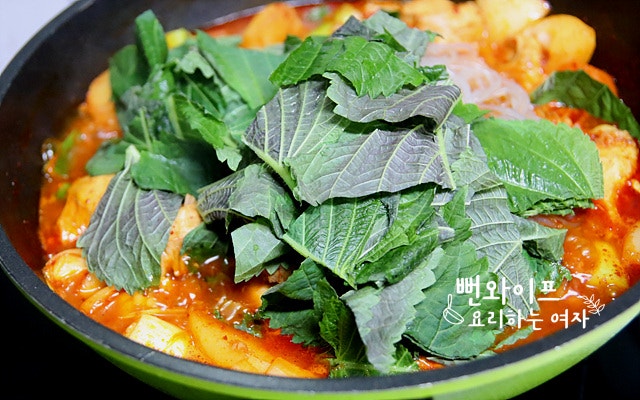 Add remaining seasoning and simmer — step photo 2