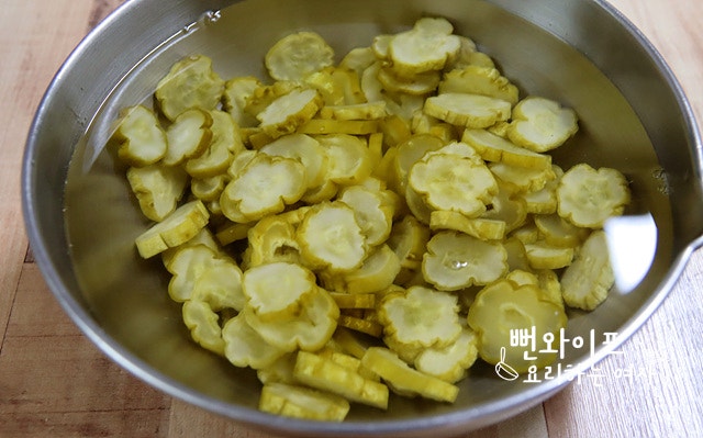 Slice the pickled cucumbers — step photo 1