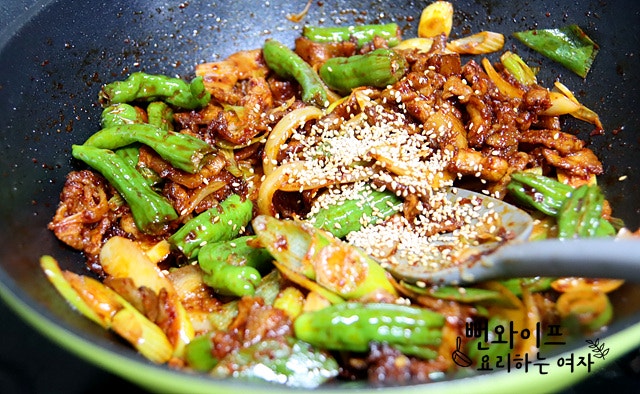 Add vegetables and seasoning, then stir-fry — step photo 2