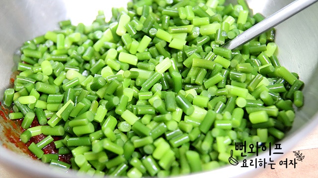 Season the garlic scapes — step photo 1