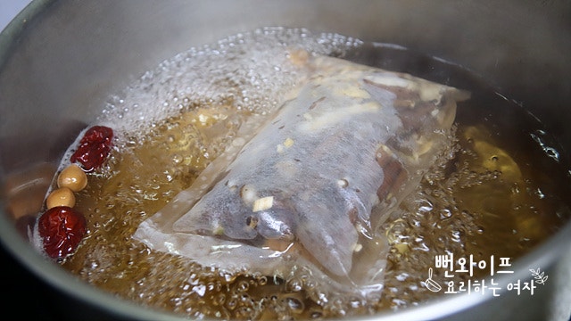 Simmer the medicinal herbs — step photo 2