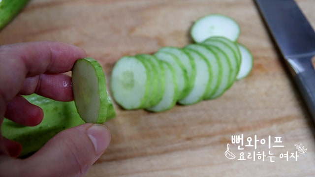 Slice the cucumbers — step photo 2