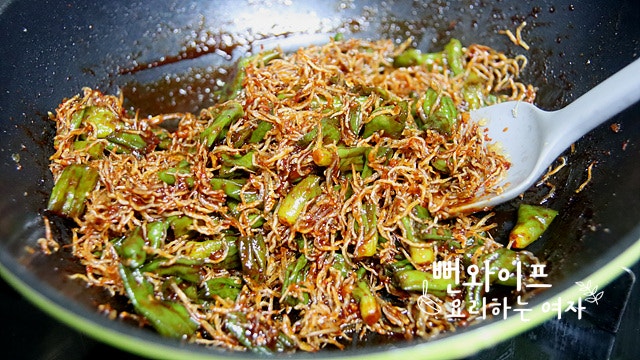 Add the anchovies and mix — step photo 2