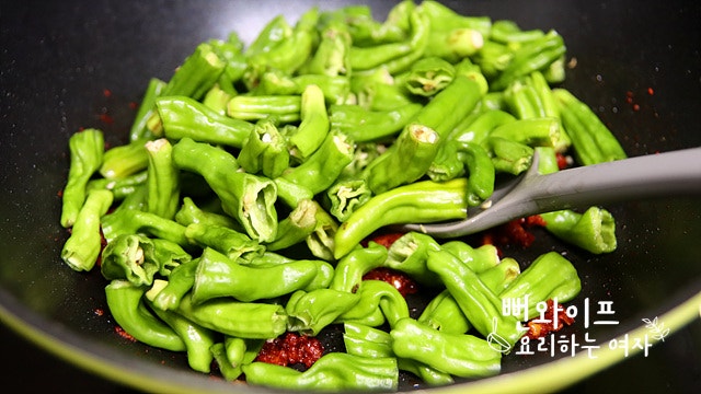 Stir-fry the shishito peppers — step photo 1