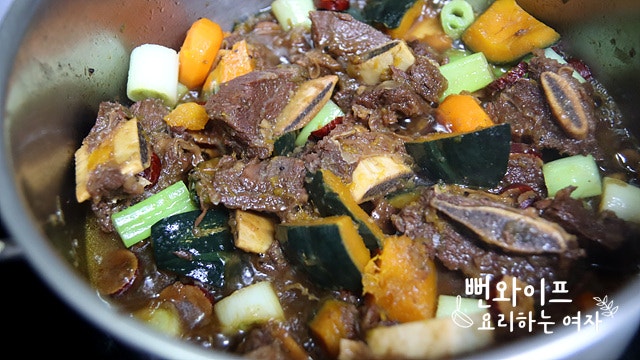 Add vegetables and simmer down — step photo 2